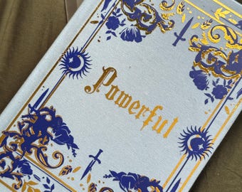 Powerful de Lauren Roberts Rebind azul y dorado