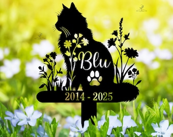May include: Black metal silhouette of a cat with flowers and the name "Blu" and the dates "2014-2025" on a garden stake.
