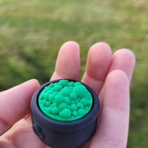 halloween cauldron fidget keychain