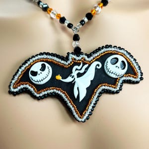 Hand beaded Halloween necklace, orange, black, and white beads, skeleton beads, this would make a great gift for her for Halloween.