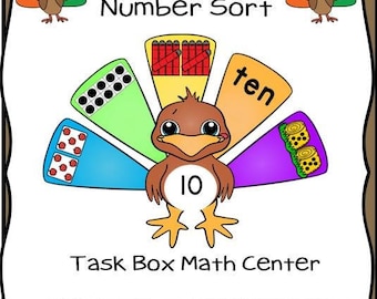 May include: A printable Thanksgiving-themed maths activity for children. The image shows a colourful turkey with the number 10 on its chest. The turkey's tail feathers are different number representations of 10, including ten circles, ten sticks, the word "ten", and ten corn cobs. The text "Build a Turkey Number Sort" is at the top of the image. The text "Task Box Maths Centre *10 Turkeys *50 Feathers Store in 4x6 task box" is at the bottom of the image.