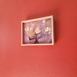 Árbol de luz de ambiente morado