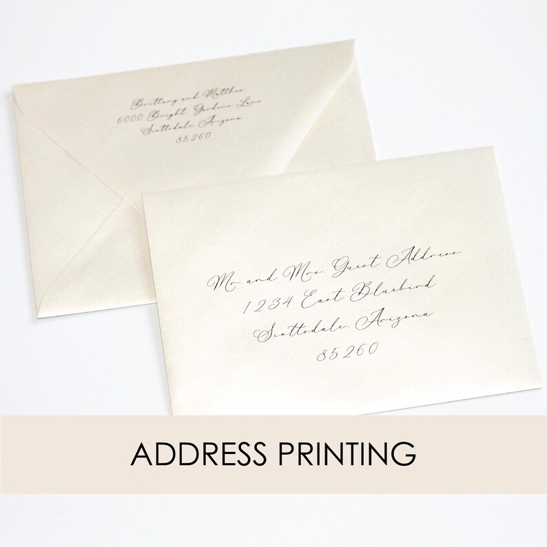 May include: Two white envelopes with black calligraphy address labels. The top envelope has the address "6000 Bright Garden Lane, Scottsdale, Arizona 85260". The bottom envelope has the address "Mr. and Mrs. Guest Address, 1234 East Blackbird, Scottsdale, Arizona 85260".