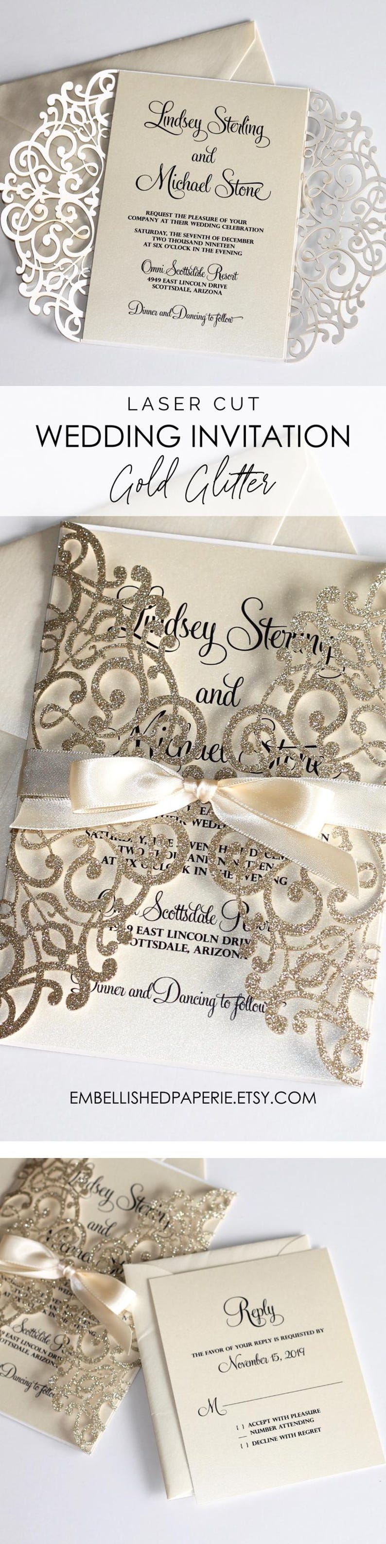 May include: Laser cut wedding invitation with gold glitter and a white lace design. The invitation features the names Lindsey Sterling and Michael Stone, the wedding date, and the location of the wedding. The text "Reply" is on a separate card with a space for the guest to RSVP.