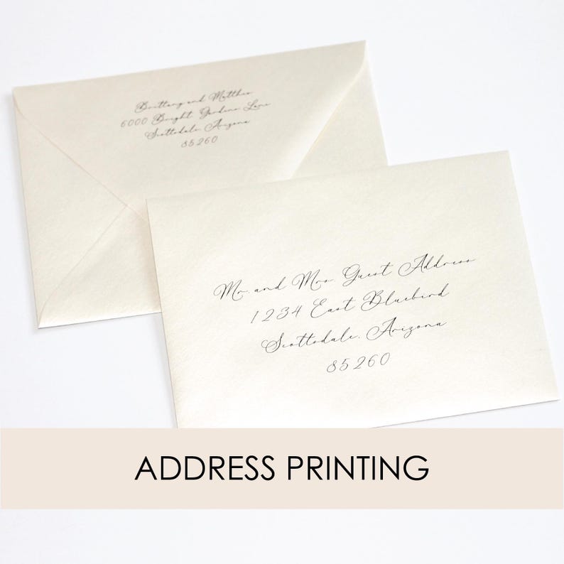 May include: Two white envelopes with black calligraphy address labels. The top envelope has the address "6000 Bright Garden Lane, Scottsdale, Arizona 85260". The bottom envelope has the address "Mr. and Mrs. Guest Address, 1234 East Blackbird, Scottsdale, Arizona 85260".