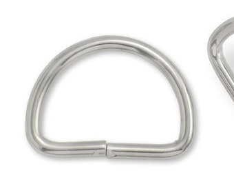 May include: Two silver metal D-rings, each with a smooth, rounded surface. The rings are open and ready to be attached to a project.