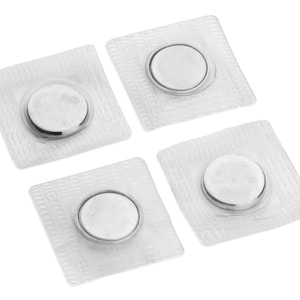 May include: Four clear plastic magnetic closures with silver metal discs. The closures are square shaped and have a textured surface.
