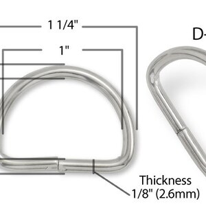 May include: A silver D-ring with a 1-inch diameter and 1/8-inch thickness. The ring is shown from two angles, with measurements in inches.