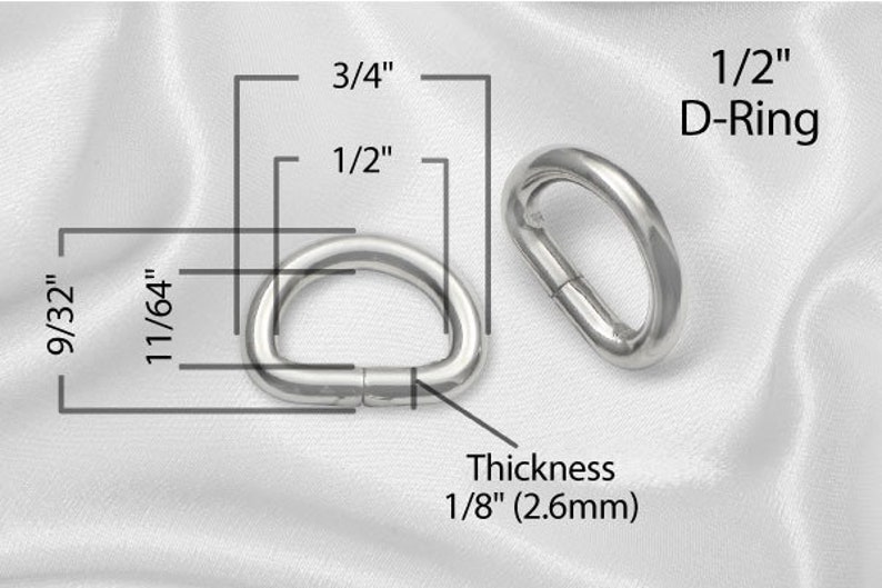 May include: A silver D-ring with a 1/2 inch diameter and 1/8 inch thickness. The ring is 3/4 inch long and 11/64 inch wide.