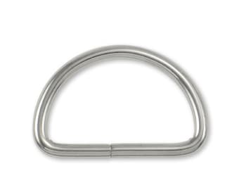 May include: A silver-toned metal D-ring with a smooth finish.