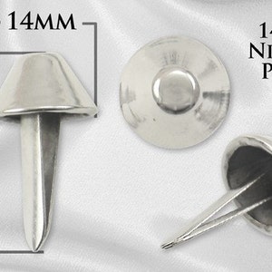 May include: Three silver-toned 14mm nickel purse feet. Each foot has a round, flat base and a cone-shaped top. The feet are designed to protect the bottom of a purse or bag from wear and tear.