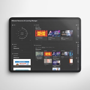 May include: A dark gray tablet screen displaying a digital resource and learning manager interface. The screen shows a clock, a list of resources, and a grid of learning modules with titles like "Super Brain", "Heal", and "Psychology".