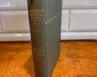 May include: A green hardcover book titled "Washington Irving's Works, Vol. II. The Alhambra Tales of a Traveler".