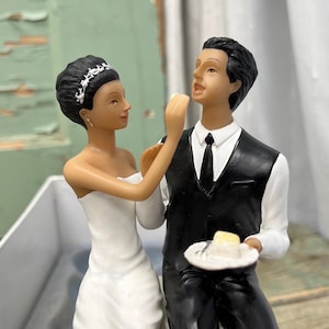 Vintage Resin Wedding Cake Topper: Playful Couple Sculpture