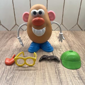 トイストーリー ミスターポテトヘッド マッサージ フィギュア レトロ