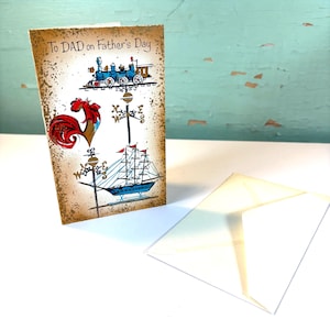 Könnte beinhalten: Eine Vatertagskarte mit Vintage-Design. Die Karte zeigt Illustrationen einer Lokomotive, eines Hahns und eines Segelboots mit dem Text "To DAD on Father's Day". Ein weißer Umschlag ist ebenfalls vorhanden.