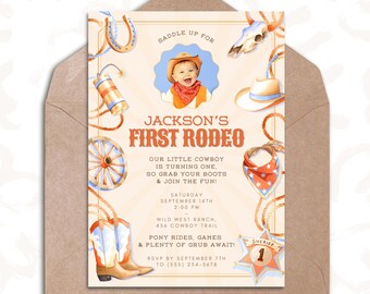 May include: A light peach-colored invitation with a photo of a baby boy wearing a red bandana and a blue shirt. The invitation says "Jackson's First Rodeo" with a cowboy hat, boots, and other western-themed illustrations. The text says "Our little cowboy is turning one, so grab your boots & join the fun!" and includes the date, time, and location of the event.