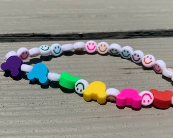 rainbow, smily face, mouse head phone charm