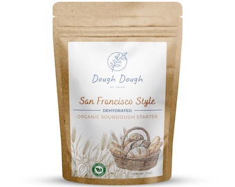 May include: A brown paper pouch with a white label. The label has a logo with the text "Dough Dough at Home" and the text "San Francisco Style Dehydrated Organic Sourdough Starter". The label also has a drawing of a basket of bread and wheat stalks.