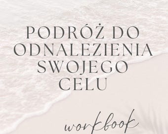 May include: A workbook with the title "PODRÓŻ DO ODNALEZIENIA SWOJEGO CELU" in dark gray lettering, with the word "workbook" in cursive script. The background features a light beige beach scene with gentle waves and a palm leaf.