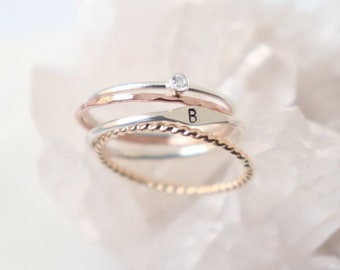 personalized stacking ring set of FOUR. initial ring. 2mm cz diamond gemstone. hammered, textured bands. gold. sterling silver. rose gold.