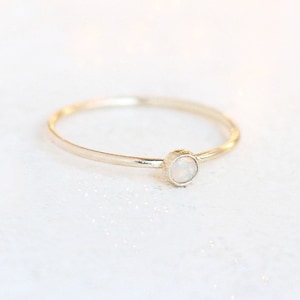 SOLID 14k gold opal ring. ONE delicate stackable birthstone ring. mothers ring. engagement ring. image 1