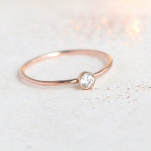 ROSE gold ring. birthstone stacking ring. cz diamond stacking ring. ONE delicate stackable minimalist ring. mothers ring. 14k gold filled.