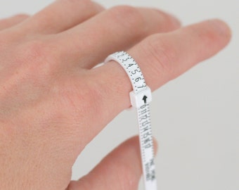 RING SIZER. find my ring size. finger sizer. adjustable ring sizer. plastic ring sizer. ring size.