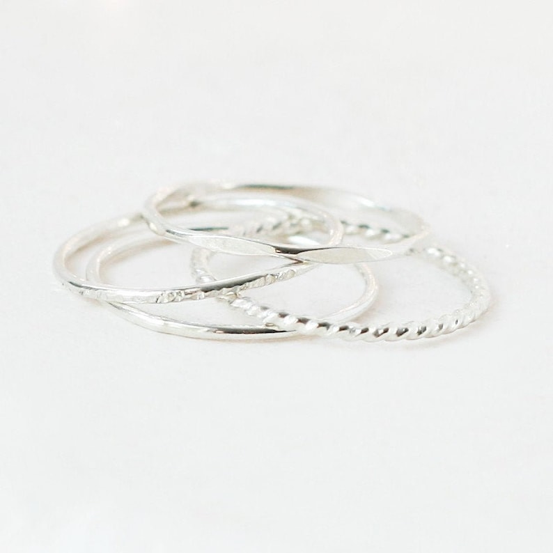 SILVER stacking rings. SET of four sterling silver rings. minimalist modern rings. skinny stack ring. hammered. knuckle ring. midi ring. image 1