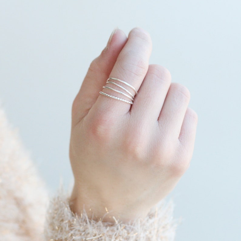 SILVER stacking rings. SET of four sterling silver rings. minimalist modern rings. skinny stack ring. hammered. knuckle ring. midi ring. image 2