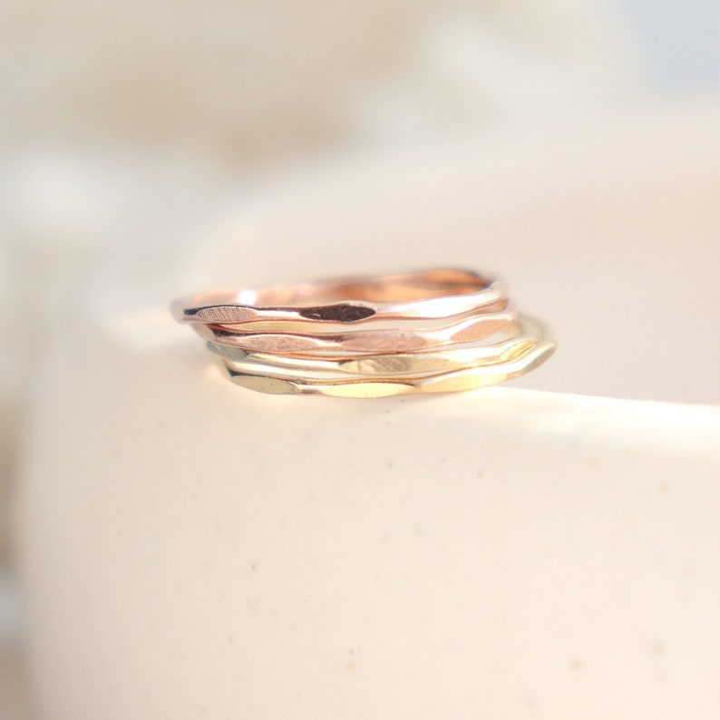 SOLID 14k gold or rose gold stacking ring. super skinny slim. hammered and shiny. ONE. classic gold stack ring. image 1