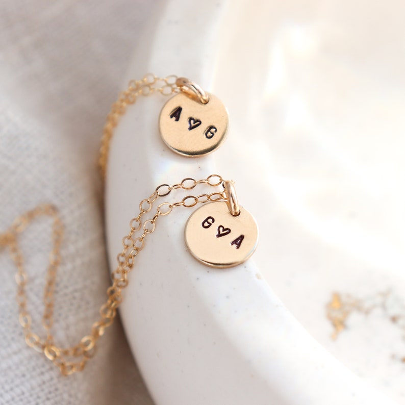 best friends gold initial necklace. couples necklace. simple gold disc necklace. mother's necklace. gift for her under 50. bridesmaid gift. image 1