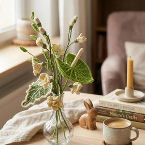 May include: A set of three ceramic mugs with a speckled, matte finish. The mugs are in shades of blue, green, and white. Each mug has a simple, modern design, perfect for coffee or tea.