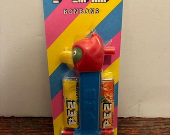 PEZ 1990 Merry Music Maker Parrot Whistle Canadian Vintage 90's Collectible Candy Dispenser Sealed MOC Canada Exclusive Bonbons Retired