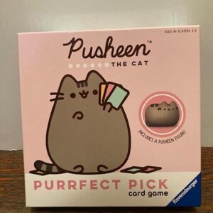 Juego de mesa Pusheen The Cat con minifigura. Juego de cartas Purrfect Pick. 100 % completo. Ravensburger 2021. Pusheenicorn Dragonsheen. Cómic Early Gamers.