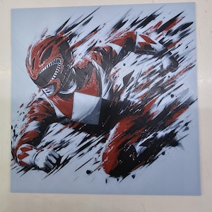 May include: A red Power Ranger in a dynamic pose, with a black and white background. The Ranger is wearing a red suit with a black helmet and a white chest emblem. The background is a stylised design of black and white lines and splatters.