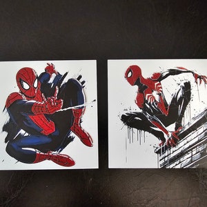 May include: Two illustrations of Spiderman in different poses. The first image shows Spiderman in a red and blue suit with a black background. The second image shows Spiderman in a red and black suit with a white background.