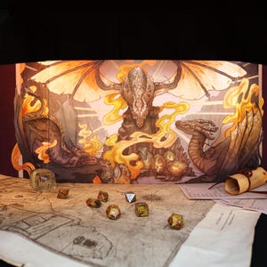May include: A multi-panel game screen featuring a fantasy dragon illustration with flames and a treasure hoard. Dice, a map, and a scroll are in the foreground. The screen is burgundy with a detailed, colorful dragon scene.