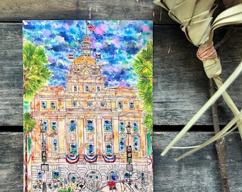 May include: A watercolor painting of a yellow building with a dome and a clock tower. The building is surrounded by palm trees and a horse-drawn carriage. The sky is blue with white clouds. The text "City Hall" is visible on the building.