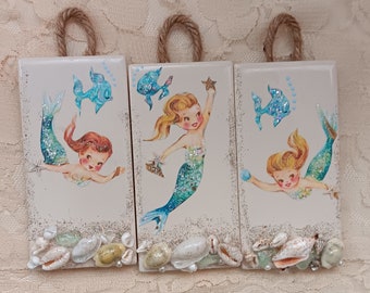 Vintage mermaids on tiles