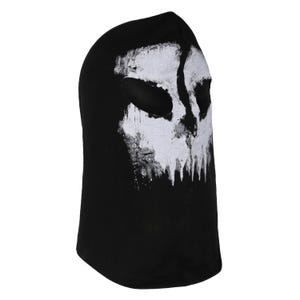 May include: Black balaclava with a white skull design on the front. The skull graphic has a distressed, textured appearance. The balaclava covers the head and neck, with openings for the eyes and mouth. The fabric appears to be a soft, knit material.