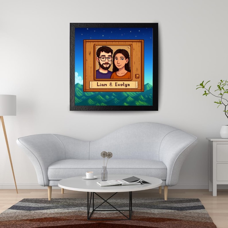May include: Framed pixel art portrait of a couple, Lian and Evelyn, set against a blue starry sky and green landscape. The artwork is in a wooden frame. The overall theme is a personalized gift, suitable for home decor.