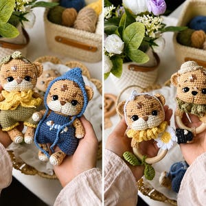 May include: Two pairs of handmade crochet tiger dolls and two crochet tiger rattles. The dolls wear outfits in yellow, green, and blue. The rattles feature wooden rings, ruffled collars, and small floral accents. The tigers have brown spots.