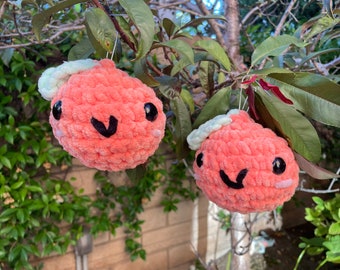 Crochet peach plushie toy amigurumi handmade gift idea. Soft and cuddly peach made with thick plush yarn.