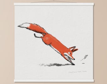 May include: A framed art print featuring a leaping fox illustration. The fox is depicted in shades of orange and white against a white background. The artwork is mounted on a wooden frame with a hanging mechanism.