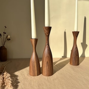 Walnut candle holders, set of 3. Handcrafted elegance for modern home decor or the perfect gift.