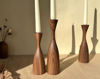 Walnut candle holders, set of 3. Handcrafted elegance for modern home decor or the perfect gift.