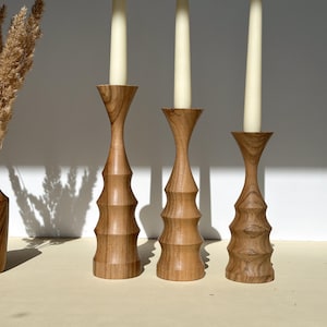 Rustic walnut wood candle holders, set of 3. Handcrafted elegance for modern home decor or the perfect gift.