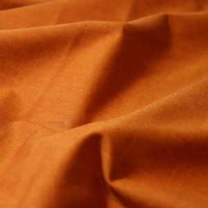 Peppered Cotton Quilting Fabric Rust Orange
