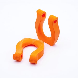 The orange color option of the Slip Grip for Beyblade X from Momo's Models.